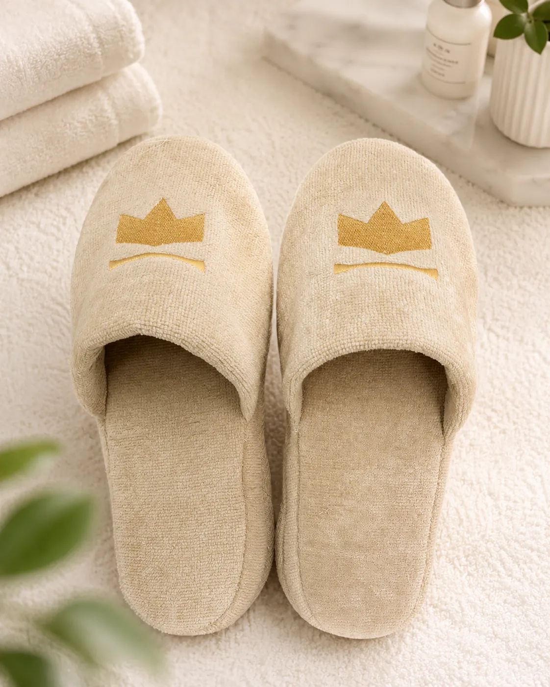 Embroidered beige hotel slippers
