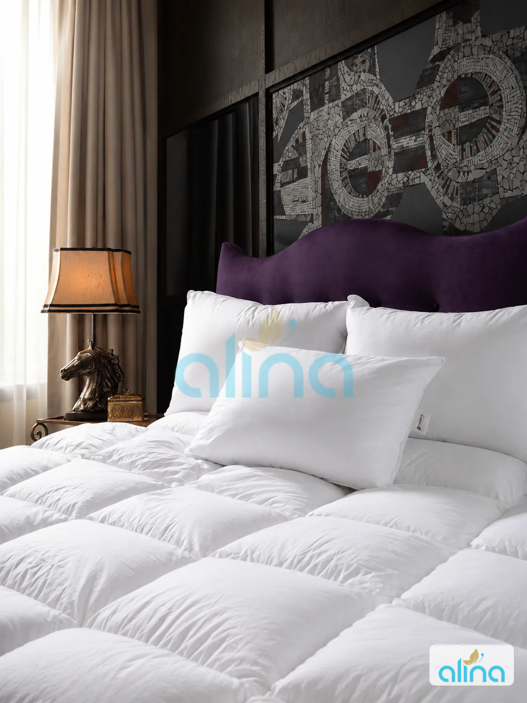 Rolled white hospitality mattress topper